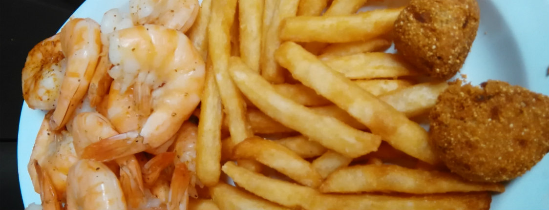 Close up of shrimp and fries