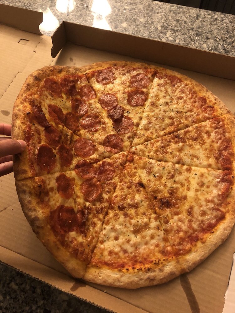 Italian pizza with tomato sauce