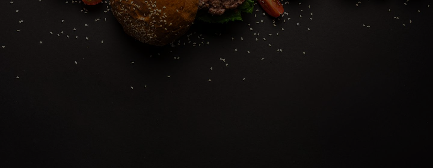 dark image with burger and sesame seeds